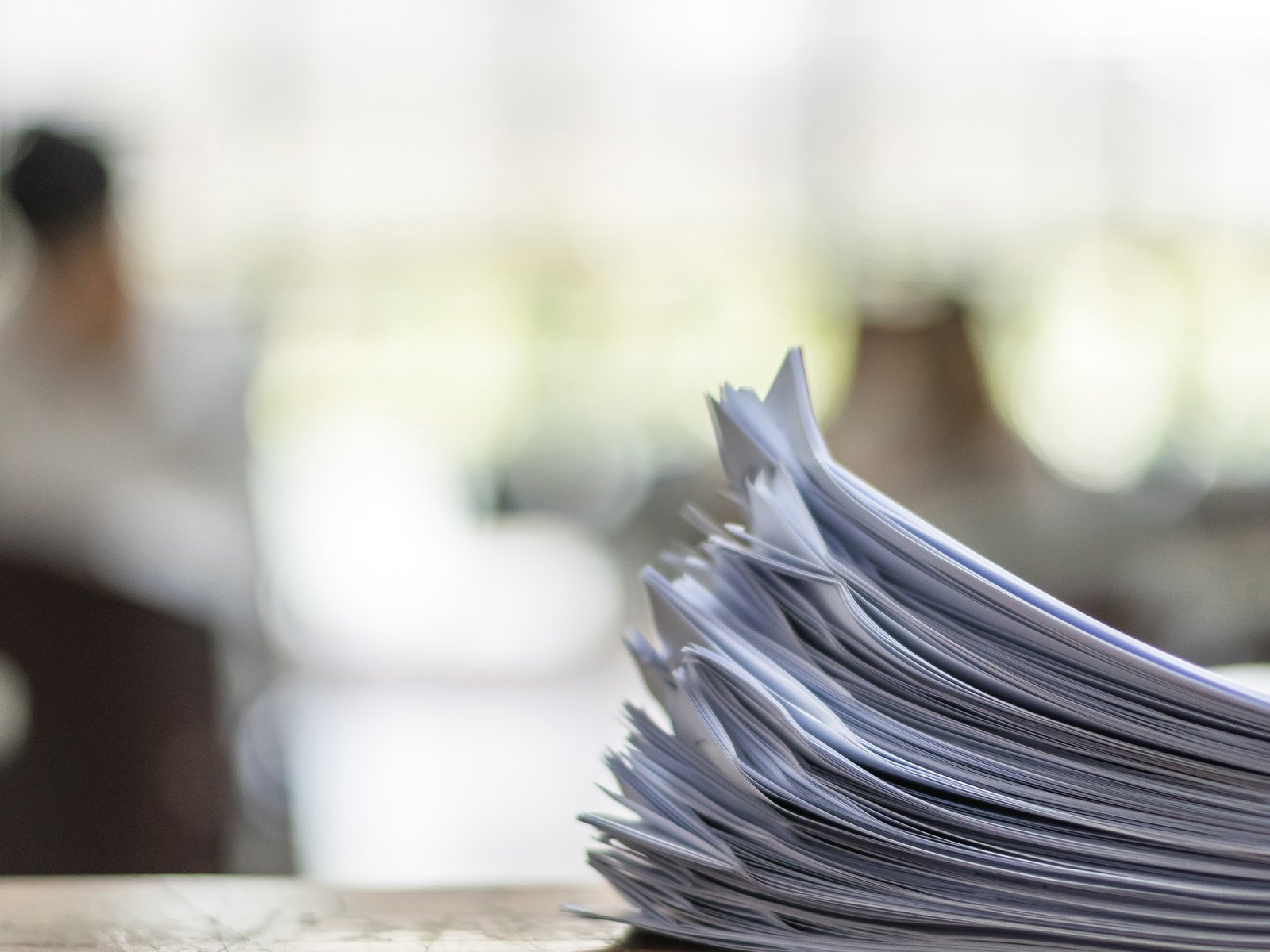A stack of produced records on a desk